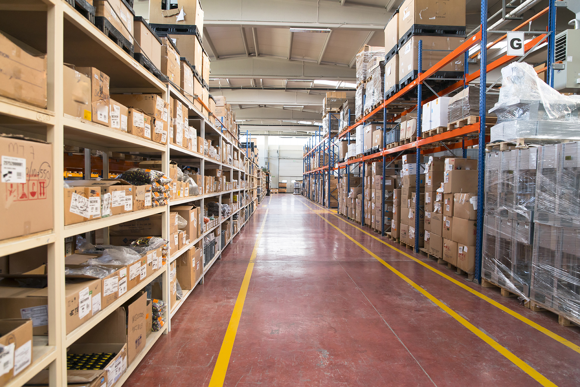 Warehouse isle with stock on shelves