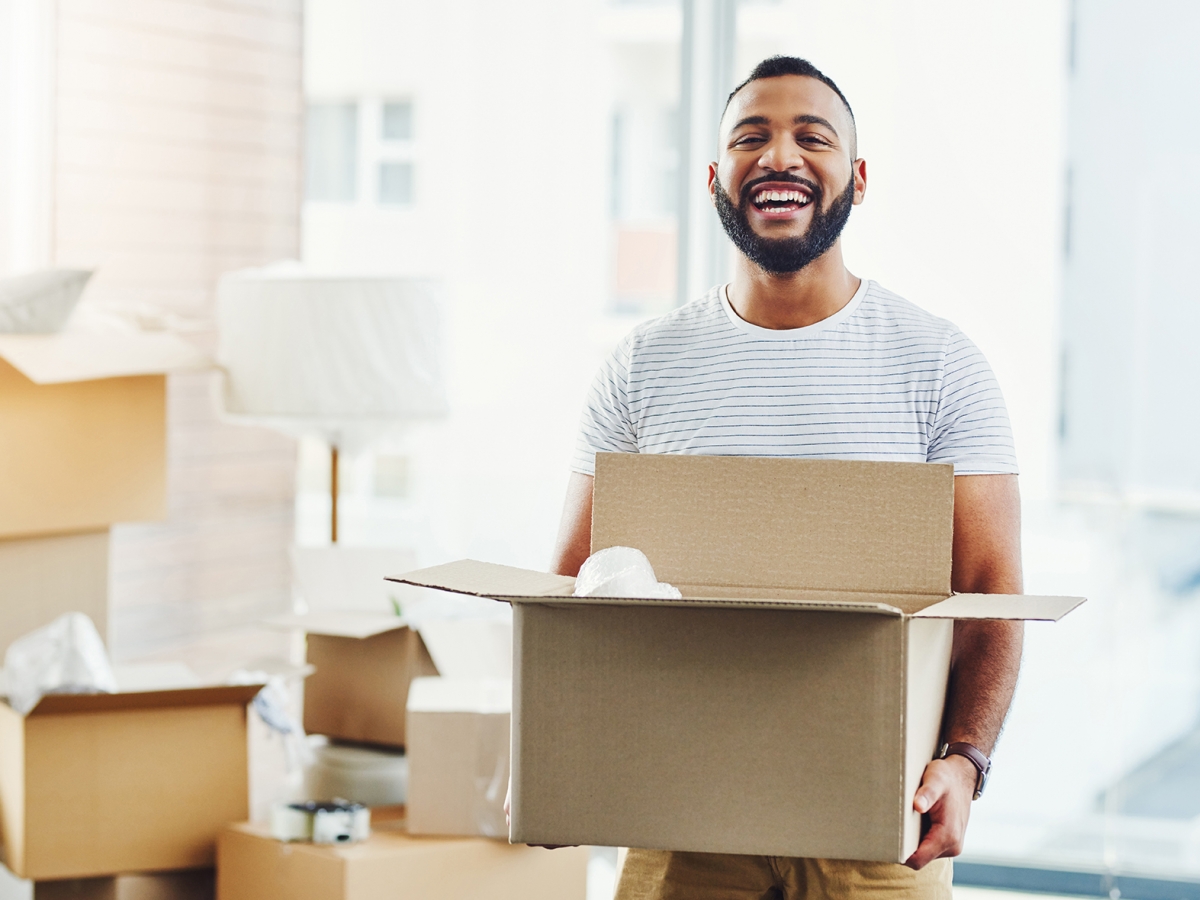 Moving Man holding a box